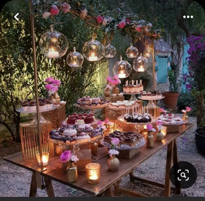 alt="Boho garden picnic setup by WawaWeEvents"